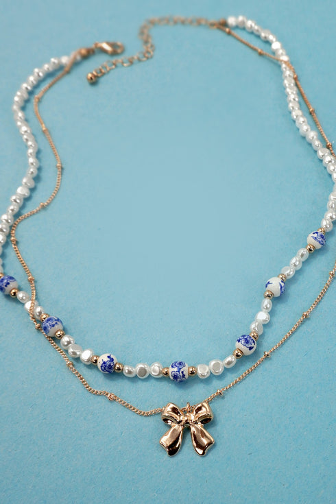 PEARL BOW LAYER NECKLACE